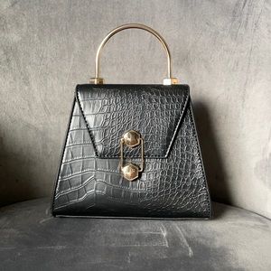 Badgley Mischka crossbody frame bag.